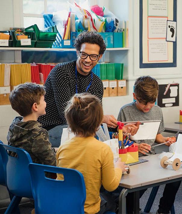 male teacher with students